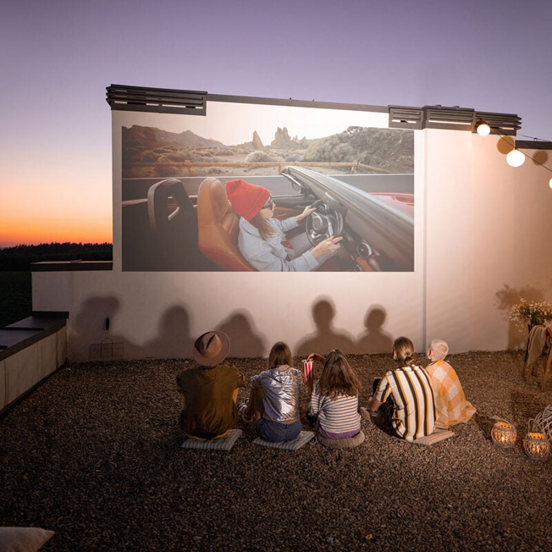 Outdoor projector screen paint on rooftop wall